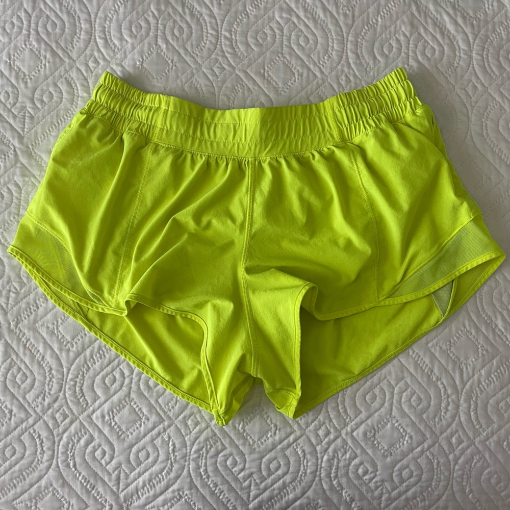 neon yellow Lululemon Speed up shorts, 2.5 inch low rise.